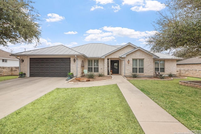 608 W Morse St, Fredericksburg, TX 78624 - ranch-style home featuring a standing seam roof, a garage, stone siding, and concrete driveway