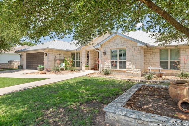 608 W Morse St, Fredericksburg, TX 78624 - ranch-style house with metal roof, a garage, stone siding, and concrete driveway
