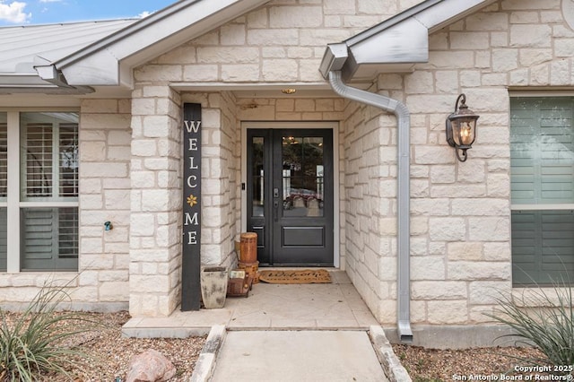 608 W Morse St, Fredericksburg, TX 78624 - doorway to property featuring stone siding