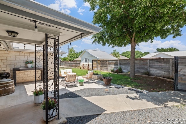 608 W Morse St, Fredericksburg, TX 78624 - fenced backyard featuring a patio