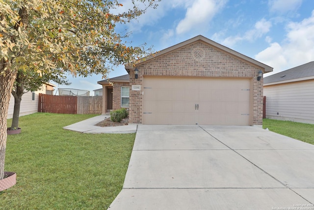 12266 Stratsburg, San Antonio, TX 78252 - single story home with brick siding, fence, a front lawn, and concrete driveway