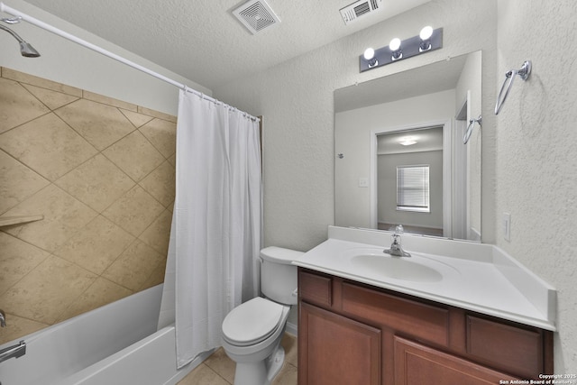 12266 Stratsburg, San Antonio, TX 78252 - full bathroom featuring toilet, a textured wall, and visible vents