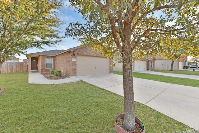 12266 Stratsburg, San Antonio, TX 78252 - ranch-style home featuring concrete driveway, fence, an attached garage, a front yard, and brick siding