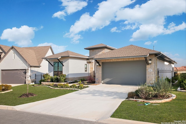23427 Grande Vis, San Antonio, TX 78261 - view of front of home featuring a front lawn, stone siding, a garage, and concrete driveway