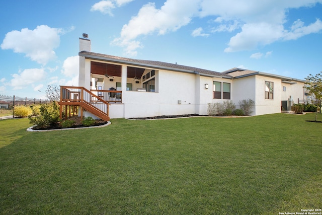 23427 Grande Vis, San Antonio, TX 78261 - back of house with fence, stairway, and a yard