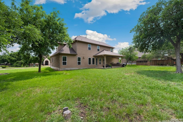146 Sunrise Hl, Castroville, TX 78009 - back of house with a yard, a patio area, and fence
