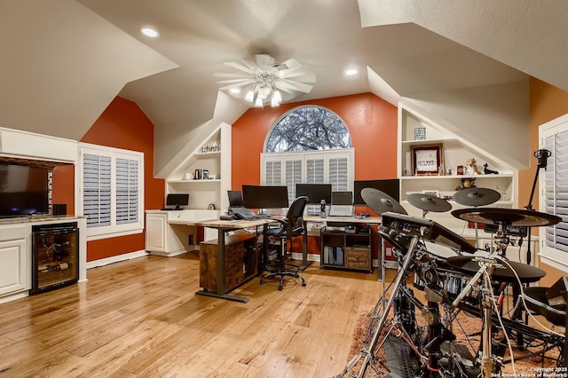 409 Sandy Oaks, Boerne, TX 78015 - office area with vaulted ceiling, built in shelves, beverage cooler, light wood-style flooring, and ceiling fan