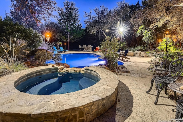 409 Sandy Oaks, Boerne, TX 78015 - view of pool featuring a pool with connected hot tub and a patio area