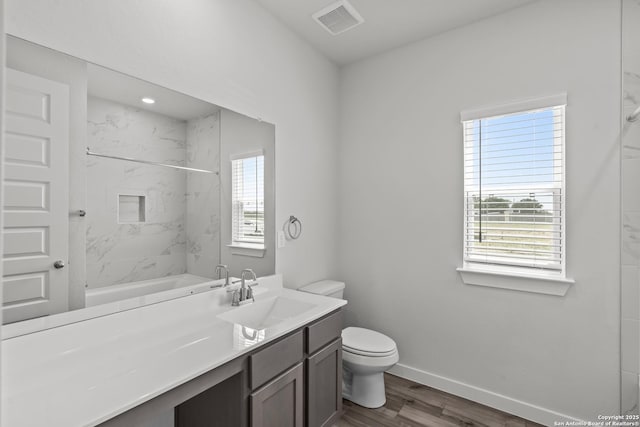 1509 Passmore Downs, New Braunfels, TX 78130 - full bath with toilet, healthy amount of natural light, and wood finished floors