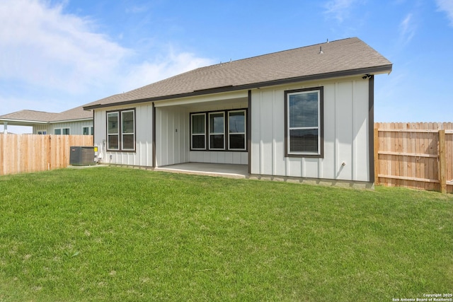 1509 Passmore Downs, New Braunfels, TX 78130 - back of house featuring board and batten siding, a patio area, roof with shingles, and central air condition unit
