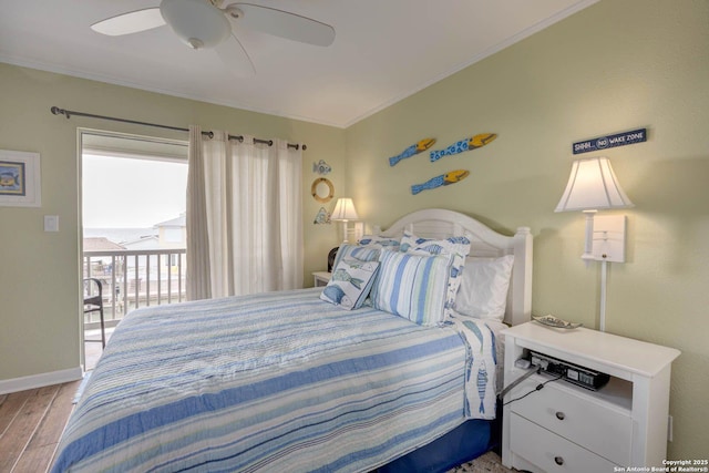 bedroom with ornamental molding, baseboards, ceiling fan, and wood finished floors