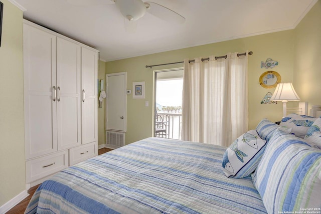 bedroom with baseboards, dark wood-style flooring, crown molding, and a ceiling fan