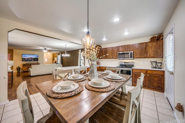 dining space featuring a ceiling fan, recessed lighting, and light tile patterned floors
