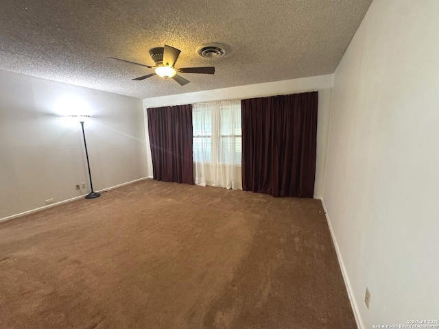 430 Anton, San Antonio, TX 78223 - carpeted spare room featuring a textured ceiling, visible vents, baseboards, and a ceiling fan
