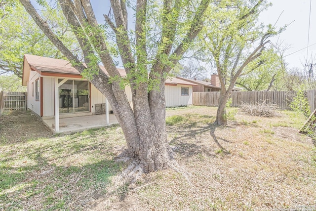 view of yard featuring a fenced backyard and a patio area