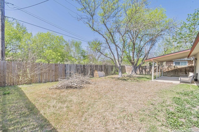 view of yard featuring a patio and a fenced backyard
