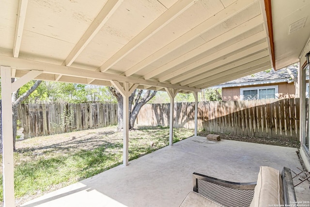 view of patio featuring a fenced backyard