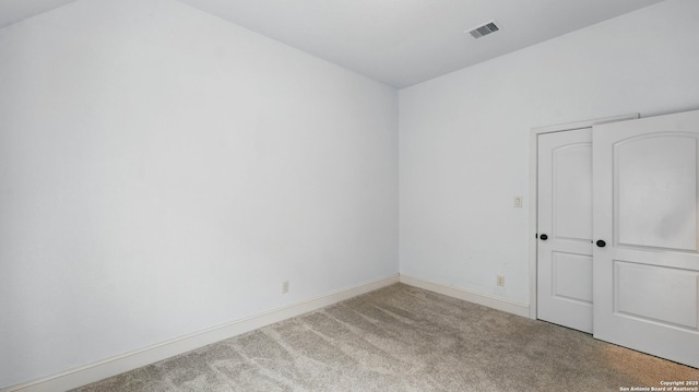 2144 Pioneer Pass, Seguin, TX 78155 - unfurnished bedroom featuring carpet floors, a closet, and baseboards