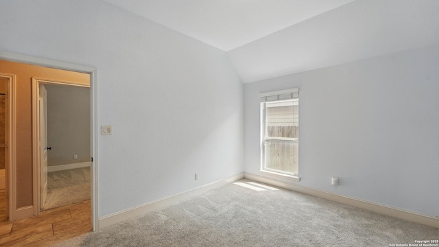 2144 Pioneer Pass, Seguin, TX 78155 - carpeted spare room with vaulted ceiling and baseboards