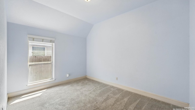 2144 Pioneer Pass, Seguin, TX 78155 - additional living space featuring carpet, vaulted ceiling, and baseboards