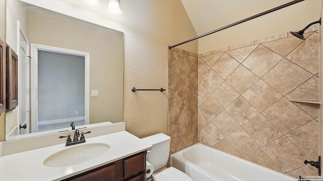 2144 Pioneer Pass, Seguin, TX 78155 - bathroom featuring a textured wall, toilet, shower / tub combination, and vanity