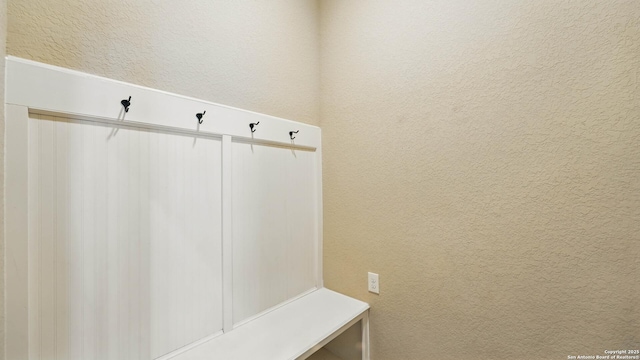 2144 Pioneer Pass, Seguin, TX 78155 - mudroom with a textured wall