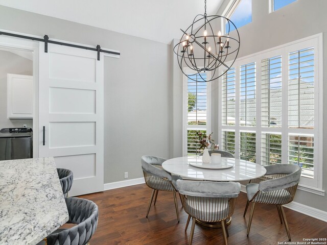 922 Split Fairway, San Antonio, TX 78260 - dining area with dark wood-type flooring, a barn door, a wealth of natural light, and a notable chandelier