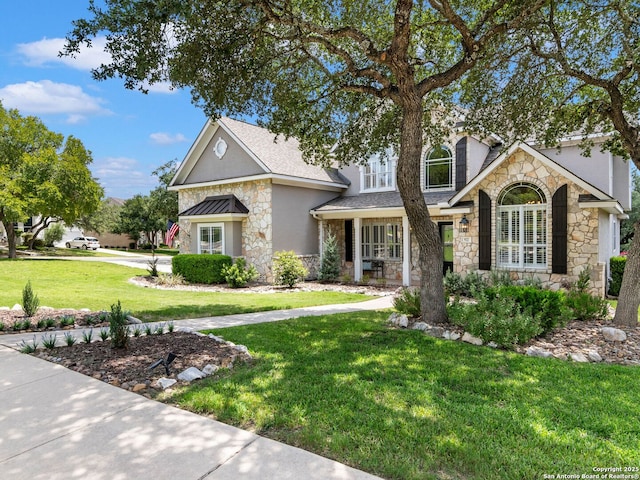 922 Split Fairway, San Antonio, TX 78260 - traditional-style home featuring stone siding, roof with shingles, and a front lawn