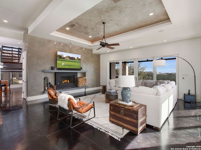7110 Bella Rose, San Antonio, TX 78256 - living area with a tray ceiling, baseboards, and ceiling fan