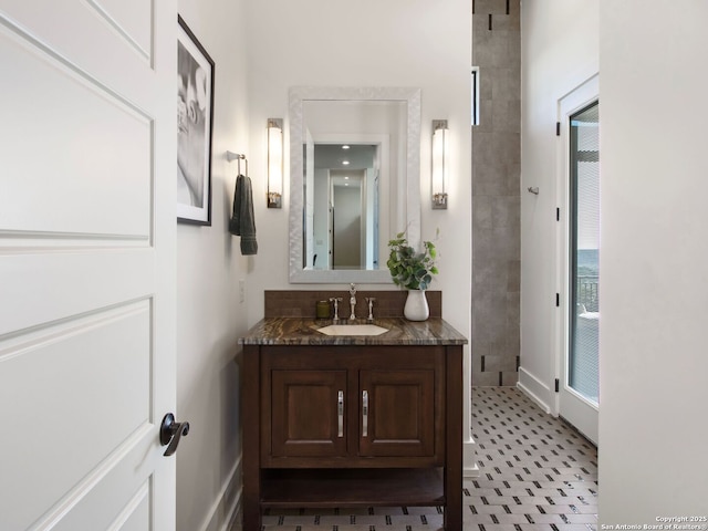 7110 Bella Rose, San Antonio, TX 78256 - bathroom featuring vanity and tiled shower