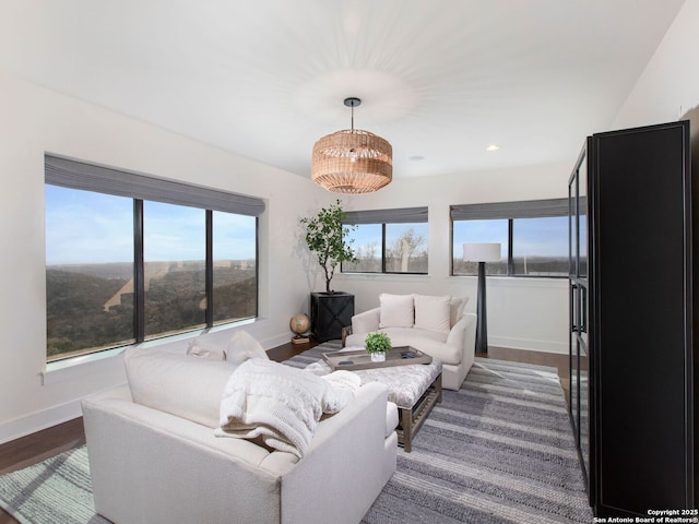 7110 Bella Rose, San Antonio, TX 78256 - living area featuring dark wood-style floors, recessed lighting, and baseboards
