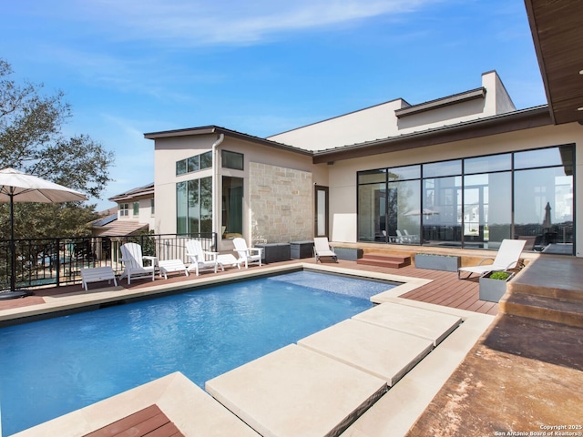 7110 Bella Rose, San Antonio, TX 78256 - view of swimming pool featuring a wooden deck, a patio area, and a fenced in pool