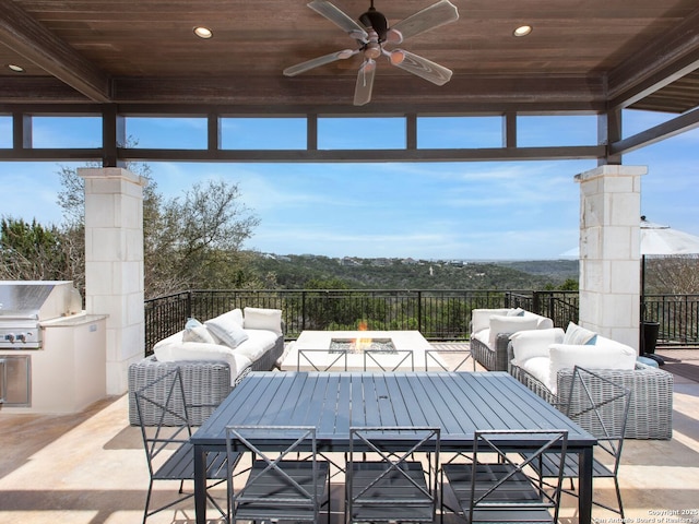 7110 Bella Rose, San Antonio, TX 78256 - view of patio featuring area for grilling, outdoor dining area, an outdoor living space with a fire pit, and grilling area