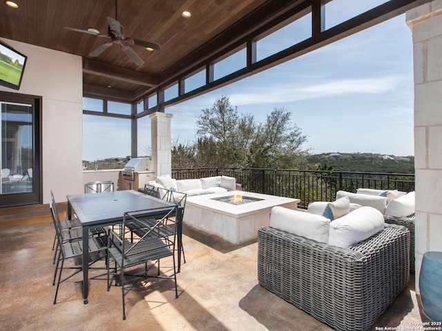 7110 Bella Rose, San Antonio, TX 78256 - view of patio with outdoor dining area, ceiling fan, a grill, an outdoor living space with a fire pit, and an outdoor kitchen