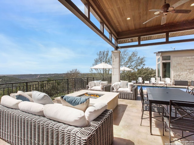 7110 Bella Rose, San Antonio, TX 78256 - view of patio / terrace featuring a ceiling fan and an outdoor living space with a fire pit