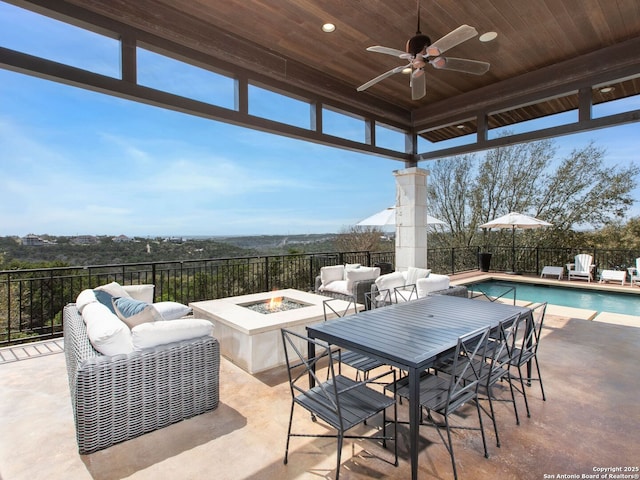 7110 Bella Rose, San Antonio, TX 78256 - view of patio / terrace with a ceiling fan, an outdoor living space with a fire pit, a fenced in pool, and fence