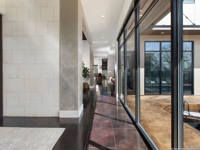 7110 Bella Rose, San Antonio, TX 78256 - corridor featuring granite finish floor, recessed lighting, baseboards, and an accent wall