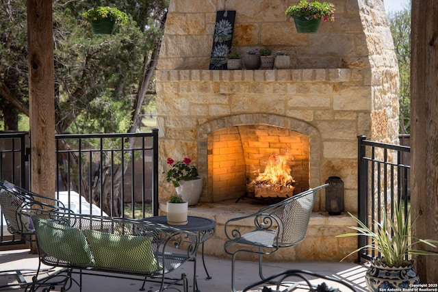 1931 Havenwood Blvd, New Braunfels, TX 78132 - view of patio / terrace with an outdoor stone fireplace