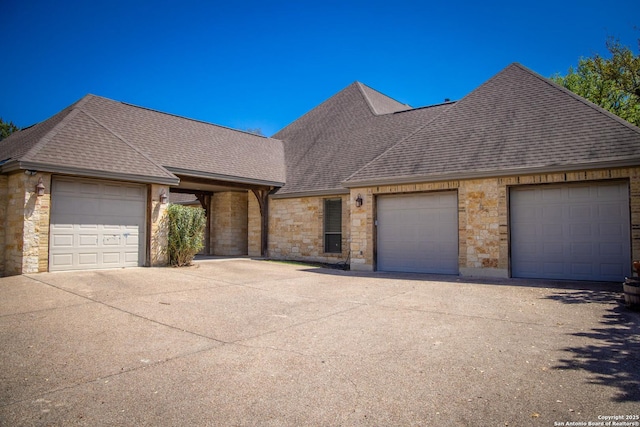 1931 Havenwood Blvd, New Braunfels, TX 78132 - view of front of house with stone siding and a shingled roof