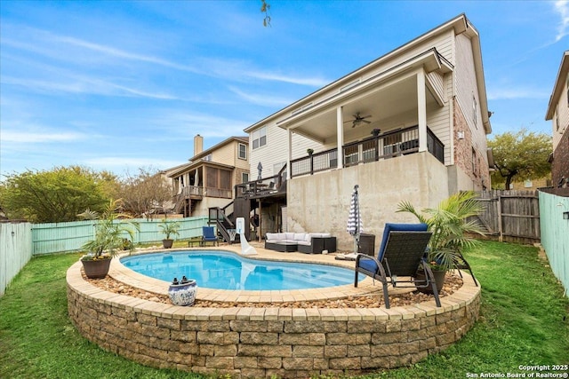 view of swimming pool featuring a ceiling fan, a fenced backyard, outdoor lounge area, and a patio