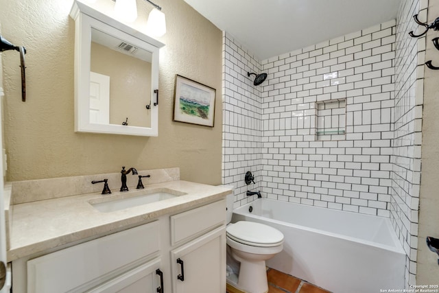 full bathroom with visible vents, toilet, vanity, shower / washtub combination, and a textured wall