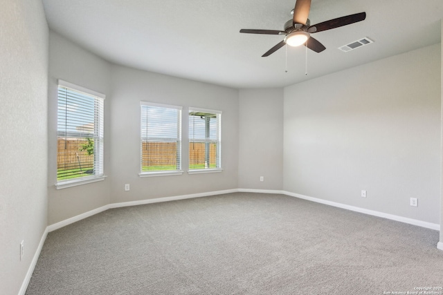 139 Perciful Ave, Cibolo, TX 78108 - unfurnished room featuring plenty of natural light, carpet floors, ceiling fan, and baseboards