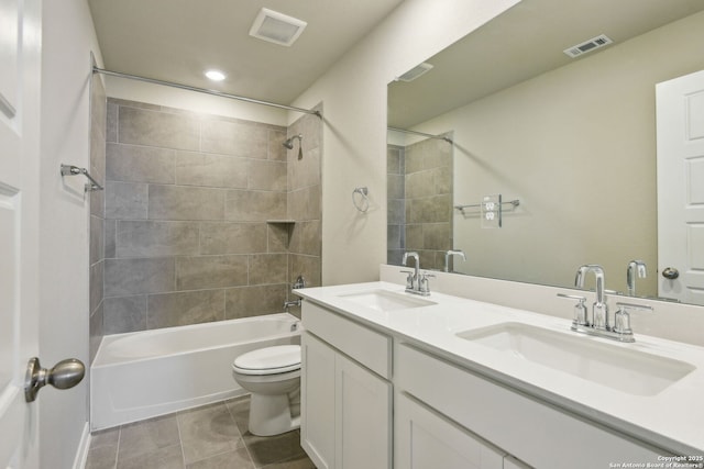 139 Perciful Ave, Cibolo, TX 78108 - full bath featuring toilet, double vanity, bathtub / shower combination, tile patterned floors, and recessed lighting