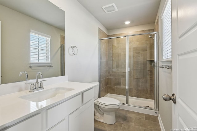 139 Perciful Ave, Cibolo, TX 78108 - full bathroom featuring vanity, a shower stall, toilet, recessed lighting, and tile patterned floors
