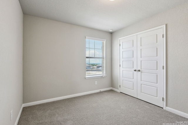 139 Perciful Ave, Cibolo, TX 78108 - unfurnished bedroom with carpet floors, a closet, and baseboards