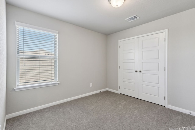 139 Perciful Ave, Cibolo, TX 78108 - unfurnished bedroom with carpet, a closet, and baseboards