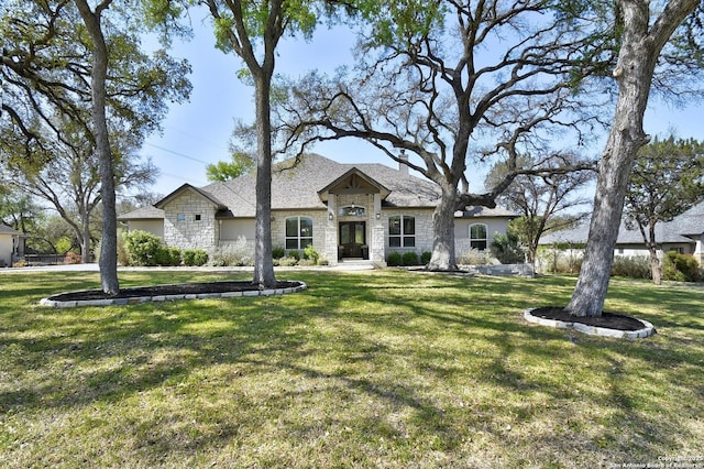 1609 Havenwood, New Braunfels, TX 78132 - french country home with stone siding and a front yard
