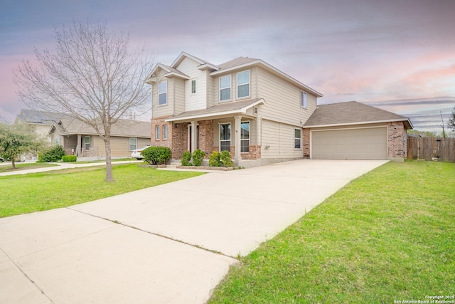 view of front of property with driveway, brick siding, fence, and a front lawn
