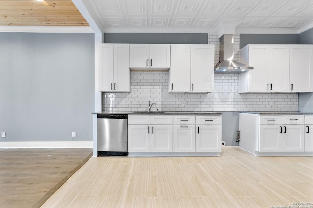 129 Cincinnati, San Antonio, TX 78201 - kitchen featuring an ornate ceiling, baseboards, stainless steel dishwasher, a sink, and wall chimney range hood