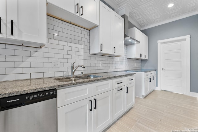129 Cincinnati, San Antonio, TX 78201 - kitchen featuring dishwasher, an ornate ceiling, tasteful backsplash, a sink, and wall chimney range hood